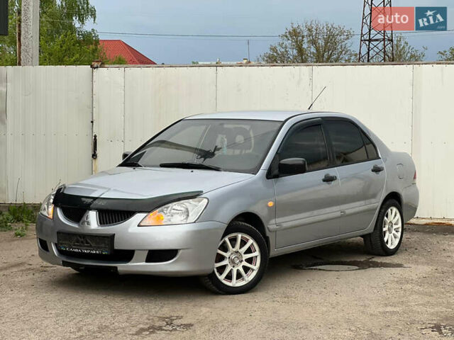 Сірий Міцубісі Lancer, об'ємом двигуна 1.6 л та пробігом 310 тис. км за 3350 $, фото 3 на Automoto.ua