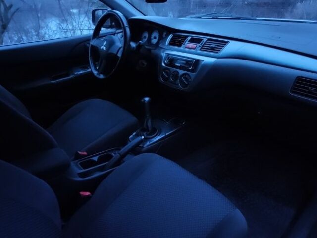 Серый Мицубиси Лансер, объемом двигателя 1.6 л и пробегом 235 тыс. км за 2850 $, фото 14 на Automoto.ua