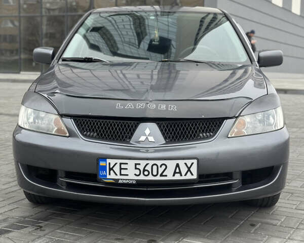 Серый Мицубиси Лансер, объемом двигателя 1.58 л и пробегом 237 тыс. км за 2999 $, фото 7 на Automoto.ua