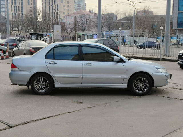 Сірий Міцубісі Lancer, об'ємом двигуна 1.6 л та пробігом 300 тис. км за 5290 $, фото 8 на Automoto.ua