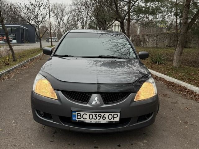 Сірий Міцубісі Lancer, об'ємом двигуна 1.6 л та пробігом 230 тис. км за 2799 $, фото 9 на Automoto.ua