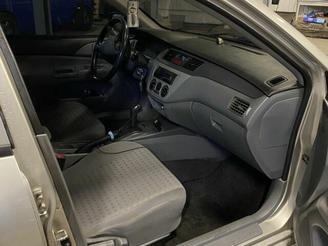 Сірий Міцубісі Lancer, об'ємом двигуна 1.3 л та пробігом 304 тис. км за 3950 $, фото 2 на Automoto.ua