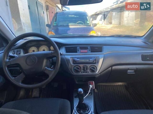 Мицубиси Лансер 2005 в Черновцах на Automoto.ua Серый Мицубиси Лансер, объемом двигателя 1.58 л и пробегом 315 тыс. км за 3000 $, фото 8 на Automoto.ua