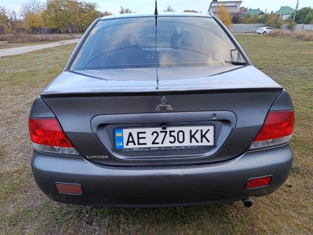 Міцубісі Lancer 2005 у Кам'янське (Дніпродзержинськ) на Automoto.ua Сірий Міцубісі Lancer, об'ємом двигуна 1.6 л та пробігом 220 тис. км за 4100 $, фото 6 на Automoto.ua
