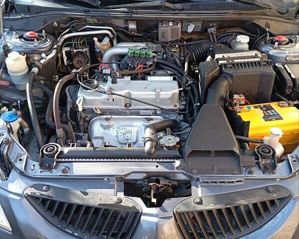 Серый Мицубиси Лансер, объемом двигателя 1.58 л и пробегом 275 тыс. км за 4500 $, фото 5 на Automoto.ua