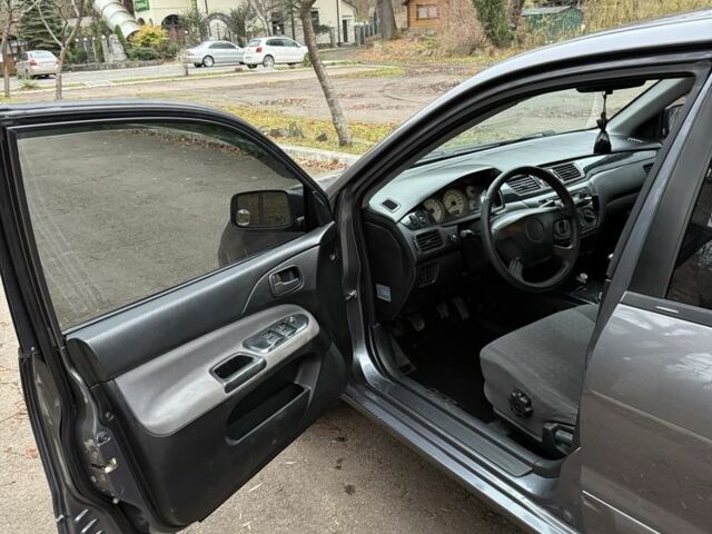 Сірий Міцубісі Lancer, об'ємом двигуна 1.6 л та пробігом 230 тис. км за 2799 $, фото 20 на Automoto.ua