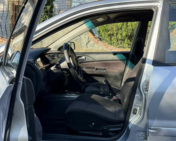 Сірий Міцубісі Lancer, об'ємом двигуна 2 л та пробігом 346 тис. км за 3200 $, фото 14 на Automoto.ua