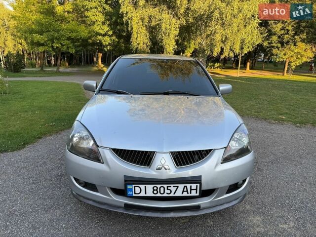 Сірий Міцубісі Lancer, об'ємом двигуна 2 л та пробігом 360 тис. км за 3400 $, фото 8 на Automoto.ua
