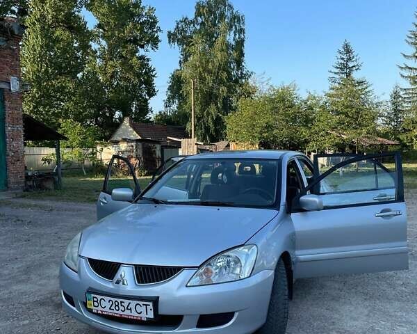 Сірий Міцубісі Lancer, об'ємом двигуна 1.6 л та пробігом 154 тис. км за 4700 $, фото 11 на Automoto.ua