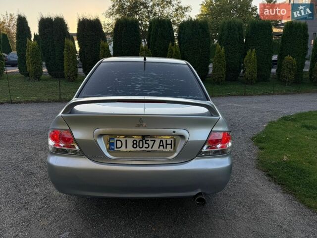 Сірий Міцубісі Lancer, об'ємом двигуна 2 л та пробігом 360 тис. км за 3400 $, фото 3 на Automoto.ua