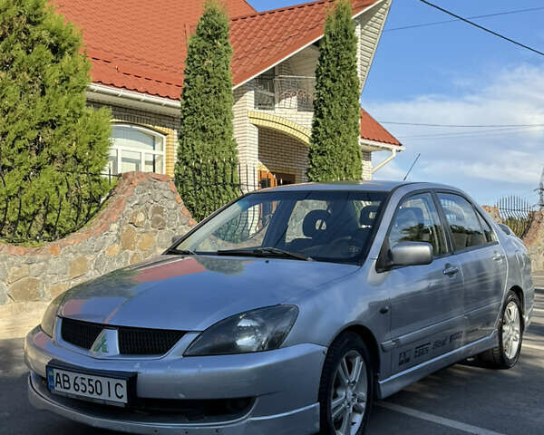Сірий Міцубісі Lancer, об'ємом двигуна 2 л та пробігом 346 тис. км за 3200 $, фото 12 на Automoto.ua