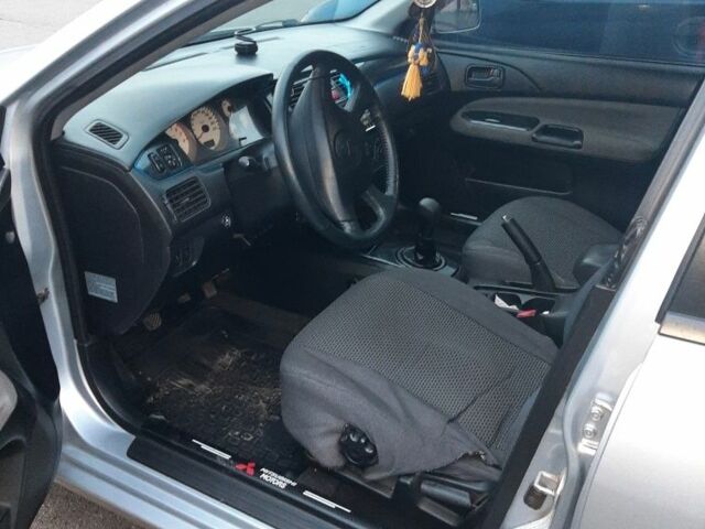 Сірий Міцубісі Lancer, об'ємом двигуна 1.6 л та пробігом 27 тис. км за 4200 $, фото 4 на Automoto.ua