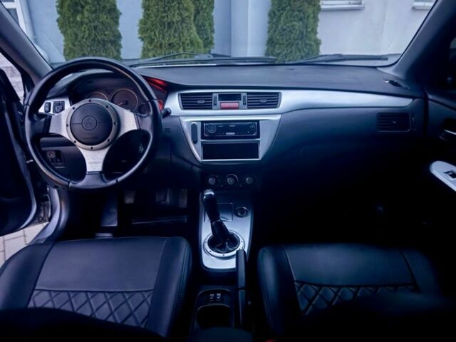 Сірий Міцубісі Lancer, об'ємом двигуна 2 л та пробігом 187 тис. км за 4497 $, фото 6 на Automoto.ua