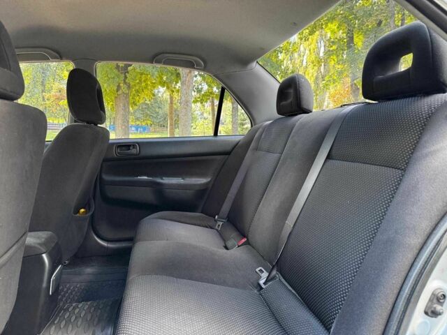 Серый Мицубиси Лансер, объемом двигателя 1.6 л и пробегом 196 тыс. км за 4390 $, фото 22 на Automoto.ua