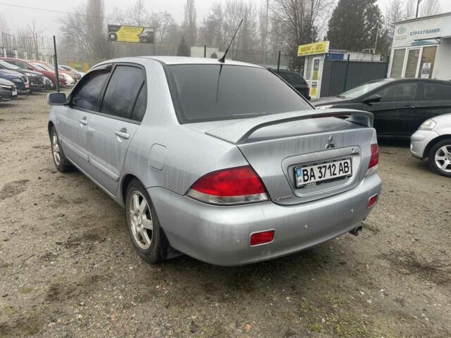 Серый Мицубиси Лансер, объемом двигателя 1.6 л и пробегом 200 тыс. км за 3906 $, фото 1 на Automoto.ua