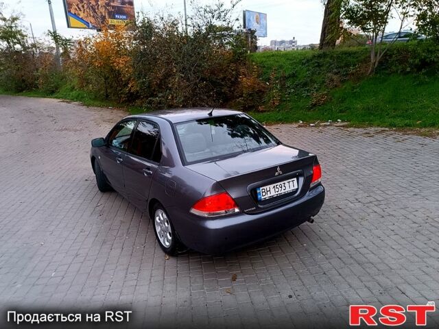 Сірий Міцубісі Lancer, об'ємом двигуна 1.6 л та пробігом 0 тис. км за 4999 $, фото 8 на Automoto.ua