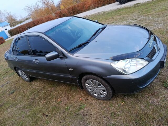 Міцубісі Lancer 2005 у Кам'янське (Дніпродзержинськ) на Automoto.ua Сірий Міцубісі Lancer, об'ємом двигуна 1.6 л та пробігом 220 тис. км за 4100 $, фото 9 на Automoto.ua