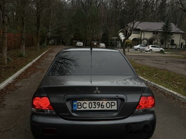 Сірий Міцубісі Lancer, об'ємом двигуна 1.6 л та пробігом 230 тис. км за 2799 $, фото 14 на Automoto.ua