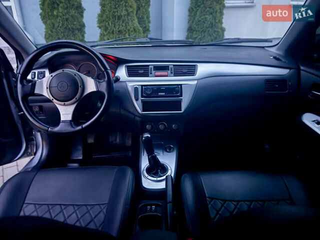 Сірий Міцубісі Lancer, об'ємом двигуна 2 л та пробігом 187 тис. км за 4600 $, фото 7 на Automoto.ua
