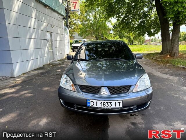 Серый Мицубиси Лансер, объемом двигателя 1.6 л и пробегом 300 тыс. км за 3850 $, фото 6 на Automoto.ua