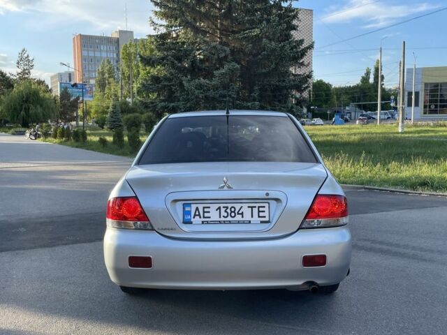 Сірий Міцубісі Lancer, об'ємом двигуна 1.6 л та пробігом 291 тис. км за 3900 $, фото 4 на Automoto.ua