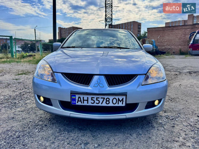 Сірий Міцубісі Lancer, об'ємом двигуна 1.58 л та пробігом 292 тис. км за 5000 $, фото 2 на Automoto.ua