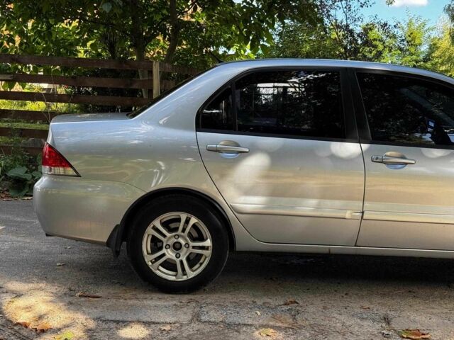 Серый Мицубиси Лансер, объемом двигателя 1.6 л и пробегом 196 тыс. км за 4390 $, фото 4 на Automoto.ua