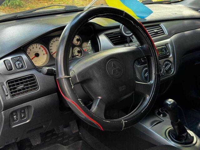 Серый Мицубиси Лансер, объемом двигателя 1.6 л и пробегом 196 тыс. км за 4390 $, фото 13 на Automoto.ua