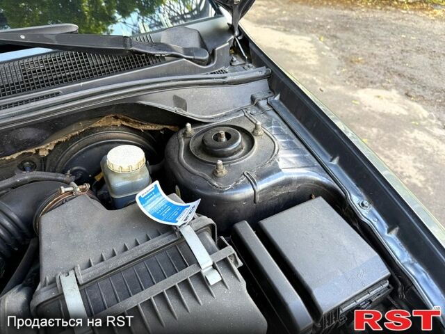 Серый Мицубиси Лансер, объемом двигателя 1.6 л и пробегом 300 тыс. км за 3850 $, фото 9 на Automoto.ua