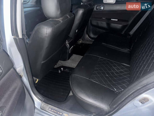 Сірий Міцубісі Lancer, об'ємом двигуна 2 л та пробігом 187 тис. км за 4600 $, фото 10 на Automoto.ua