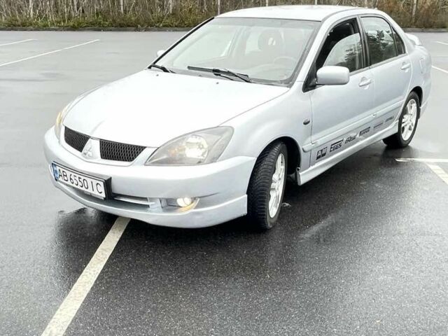 Сірий Міцубісі Lancer, об'ємом двигуна 2 л та пробігом 1 тис. км за 3500 $, фото 2 на Automoto.ua
