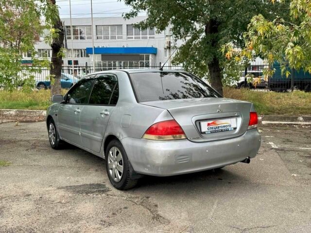 Мицубиси Лансер 2005 в Киеве на Automoto.ua Серый Мицубиси Лансер, объемом двигателя 1.58 л и пробегом 180 тыс. км за 2490 $, фото 10 на Automoto.ua