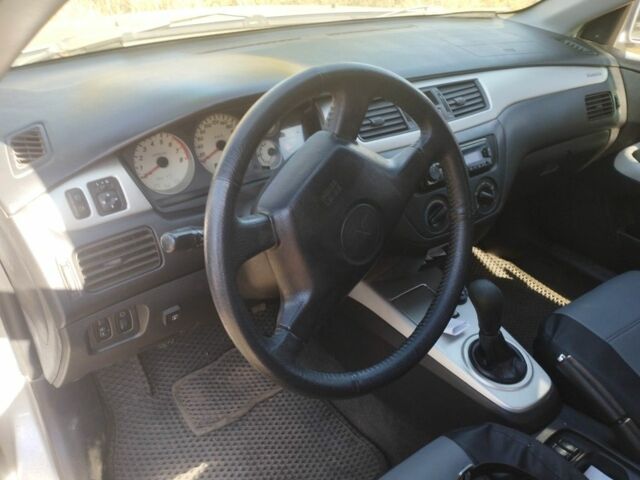 Сірий Міцубісі Lancer, об'ємом двигуна 1.6 л та пробігом 244 тис. км за 3300 $, фото 11 на Automoto.ua