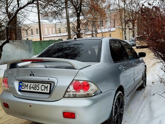 Сірий Міцубісі Lancer, об'ємом двигуна 2 л та пробігом 200 тис. км за 4500 $, фото 1 на Automoto.ua