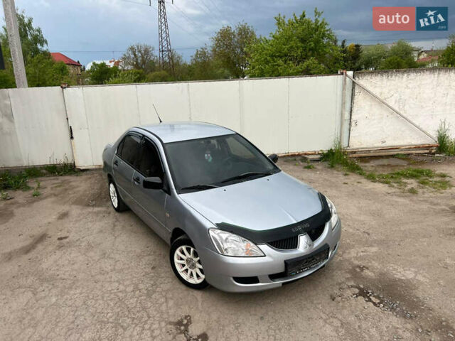 Сірий Міцубісі Lancer, об'ємом двигуна 1.6 л та пробігом 310 тис. км за 3350 $, фото 9 на Automoto.ua