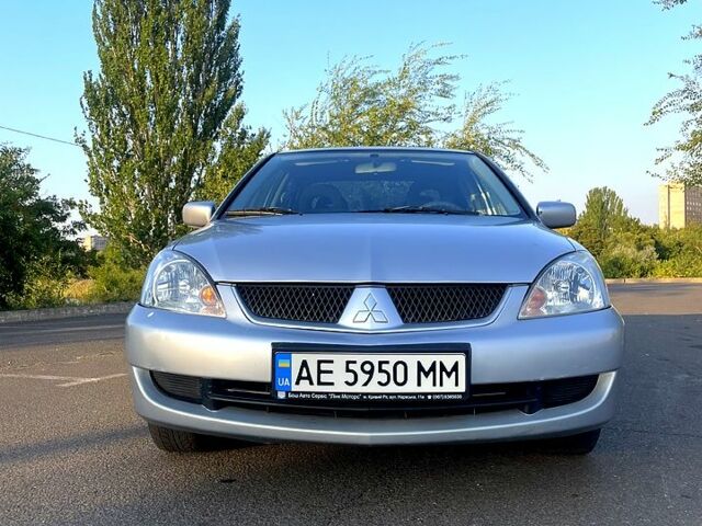 Сірий Міцубісі Lancer, об'ємом двигуна 1.6 л та пробігом 282 тис. км за 4100 $, фото 1 на Automoto.ua