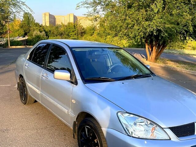 Сірий Міцубісі Lancer, об'ємом двигуна 1.6 л та пробігом 282 тис. км за 4100 $, фото 8 на Automoto.ua