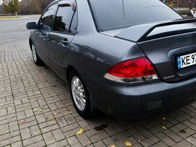 Серый Мицубиси Лансер, объемом двигателя 1.6 л и пробегом 100 тыс. км за 3500 $, фото 5 на Automoto.ua