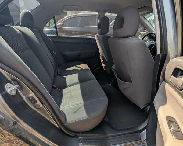 Сірий Міцубісі Lancer, об'ємом двигуна 1.58 л та пробігом 384 тис. км за 2500 $, фото 15 на Automoto.ua