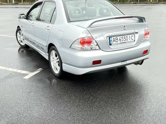Сірий Міцубісі Lancer, об'ємом двигуна 2 л та пробігом 1 тис. км за 3500 $, фото 4 на Automoto.ua