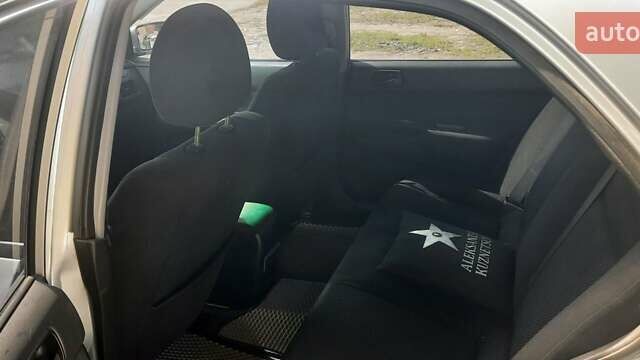 Сірий Міцубісі Lancer, об'ємом двигуна 1.58 л та пробігом 250 тис. км за 5000 $, фото 2 на Automoto.ua