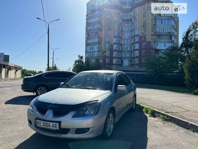 Сірий Міцубісі Lancer, об'ємом двигуна 2 л та пробігом 165 тис. км за 5000 $, фото 3 на Automoto.ua