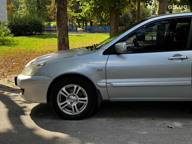 Мицубиси Лансер 2005 в Киеве на Automoto.ua Серый Мицубиси Лансер, объемом двигателя 1.6 л и пробегом 196 тыс. км за 4490 $, фото 10 на Automoto.ua