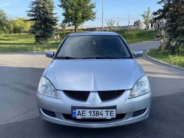 Сірий Міцубісі Lancer, об'ємом двигуна 1.6 л та пробігом 291 тис. км за 3900 $, фото 2 на Automoto.ua