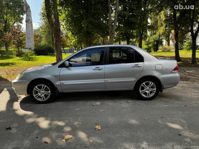 Мицубиси Лансер 2005 в Киеве на Automoto.ua Серый Мицубиси Лансер, объемом двигателя 1.6 л и пробегом 196 тыс. км за 4490 $, фото 11 на Automoto.ua