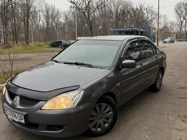 Сірий Міцубісі Lancer, об'ємом двигуна 1.6 л та пробігом 230 тис. км за 2799 $, фото 1 на Automoto.ua