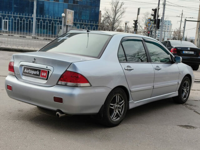 Сірий Міцубісі Lancer, об'ємом двигуна 1.6 л та пробігом 300 тис. км за 5290 $, фото 7 на Automoto.ua