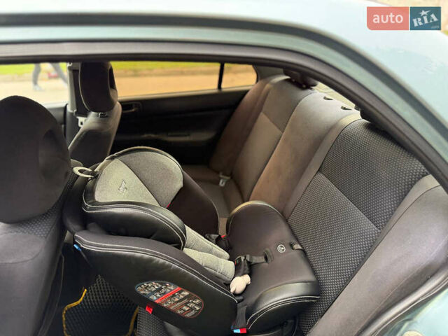 Серый Мицубиси Лансер, объемом двигателя 1.58 л и пробегом 260 тыс. км за 4050 $, фото 11 на Automoto.ua