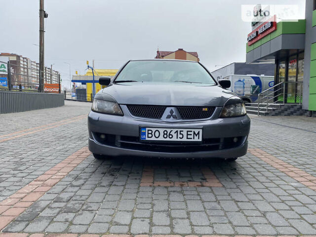 Сірий Міцубісі Lancer, об'ємом двигуна 1.58 л та пробігом 228 тис. км за 4300 $, фото 1 на Automoto.ua