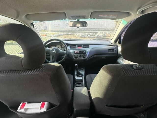 Серый Мицубиси Лансер, объемом двигателя 1.6 л и пробегом 170 тыс. км за 3700 $, фото 4 на Automoto.ua